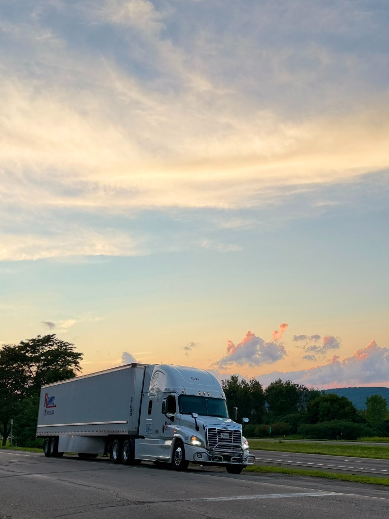 Rohno Express Ltd. Freightliner Cascadia Tractor with Branded 53' Dry Van Trailer at Sunset